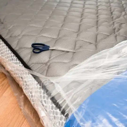 mattress in a plastic bag